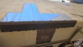 Welded patch and top rail section. Refrigerated shipping container repair.