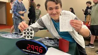 Crowd goes WILD in library after Rubik's Cube record