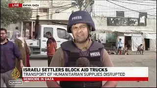 A mob of Zionist squatters destroy desperately needed humanitarian aid to Gaza