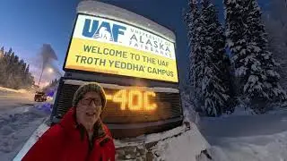 Taking pictures in front of the time/temperature sign at 40 below