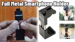 𝗨𝗹𝗮𝗻𝘇𝗶 𝗦𝘁-𝟬𝟮 Solid Metal 𝗦𝗺𝗮𝗿𝘁𝗽𝗵𝗼𝗻𝗲 𝗛𝗼𝗹𝗱𝗲𝗿 𝗧𝗿𝗶𝗽𝗼𝗱 𝗠𝗼𝘂𝗻𝘁 𝗔𝗱𝗮𝗽𝘁𝗲𝗿 For Vlogging