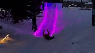 March 10, 2022 World Ice Art Championship - Kent comes down the ice slide