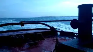 Tugboat Amy Moran towing out of RI in a swell water over the stern 7' sea