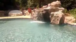 Charlotte Swimming Pool grotto waterfall rock formations