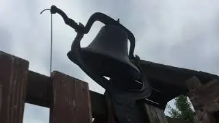 My new cast iron bell in my backyard