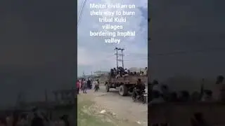 Meitei with looted weapons from Pangei Manipur police training center