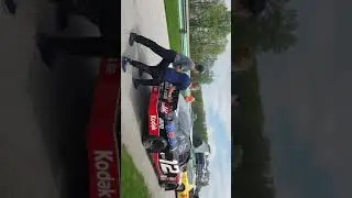 colin in pit row road america