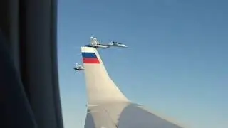 Эскорт истребителей прикрывает борт В. Путина
