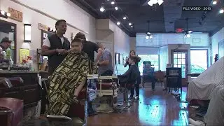 Cops and Barbers connects inner city youth with police officers, offers haircuts and back-to-school