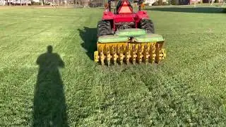 Spring aeration with a Earthworks 3-3-3 fertilizer love the sound of spoons