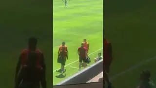 Ashley Young 18 on the touchline warming up