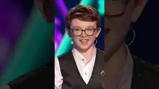 Adorable kid magician performs with a LEGEND