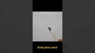 How to make phone stand using waste water bottle #shorts #craft