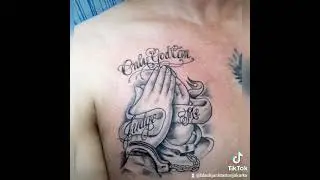 praying hand tattoo