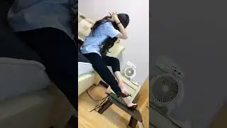 Brunette takes off her shoes to relax