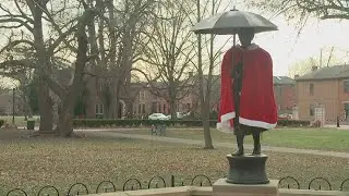 Exploring the mystery behind Schiller Park's Umbrella Girl and her red coat