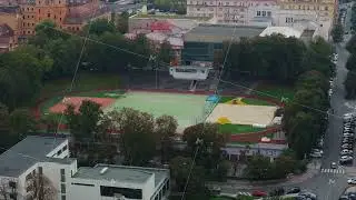 Aerial views showcase a vibrant cityscape in Brno, featuring sports fields for football and volley