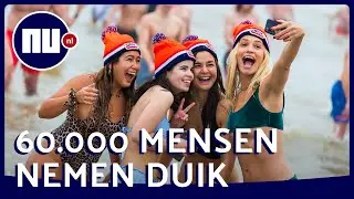 Duizenden trotseren koude water voor nieuwjaarsduik | NU.nl