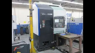 Hyundai Wia LV500R CNC Vertical Turret Lathe, Fanuc 32i, 12-Station Turret, LNS/Turbo Chip Conveyor