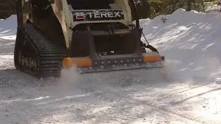 MeriCrusher MC4-140 Hydraulic mulcher&Terex skidsteer crushing ice to improve the traction