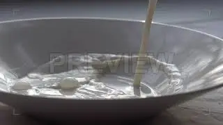 Pouring Milk Into Bowl Stock Video