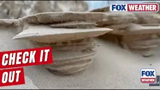 Frozen Sand Creates Striking Scene In Saint Joseph, Michigan