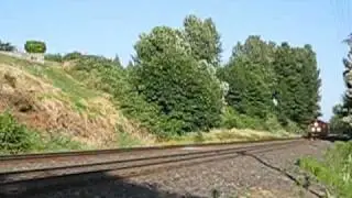 BNSF GEVO ES44AC-C4 6610 leads grain train