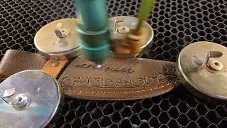 Engraving a knife sheath 