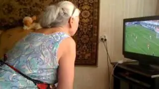Бабушка смотрит футбол (Grandma watching football)