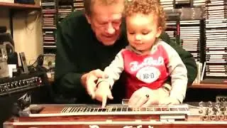 Avi and Papa Ron Klein play the steel guitar