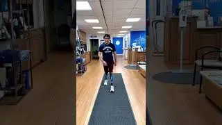 Bilateral Below-Knee Amputee Walking with Prosthetic Legs