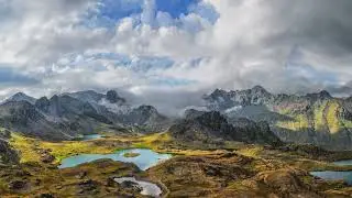4k motion video ,View on the turquoise color lake between high and rocky mountains