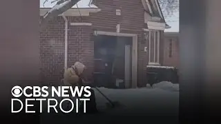 Michigan neighbors help elderly man shoveling snow