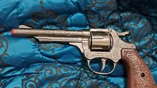 Die-cast metal cap gun revolver