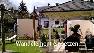 Aufbau einer Sichtschutzwand von Modulare Wandsysteme