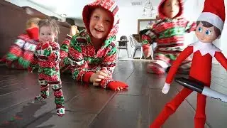 Our Elf On The Shelf is BACK and Brought us Onesie Pajamas!