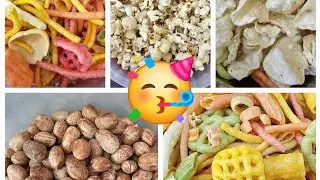 kiddo snacks.. salty peanuts.. popcorn without butter or oil. . Multicolored Fryums..