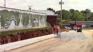 Look at how close the road is to The Workshop at Finley Farms & The Ozark Mill