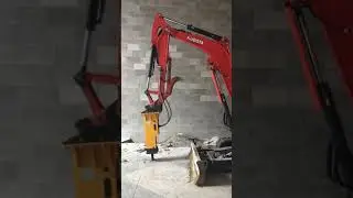 Hydraulic breaker hammer AB55S with Kubota KX033 for indoor demolition