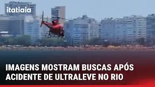 IMAGENS MOSTRAM BUSCA PELO CORPO DO PILOTO QUE CAIU COM ULTRALEVE NA PRAIA DE COPACABANA