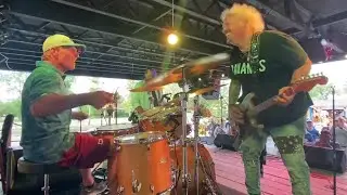 Doug Flutie plays drums at the Bills alumni music festival