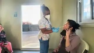 getting swabbed for COVID-19 test, entering Anguilla
