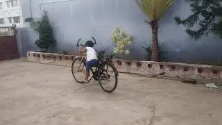 6 years old kid cycling with monkey/half pedal ( குரங்கு பெடல்)