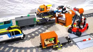 Loading cargo on a cargo wagon by Reach stacker and Lego Freight Train 60336 manoeuvres