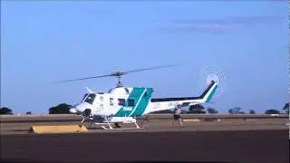 Toll Aviation Bell Twin Huey 212 departs Hamilton