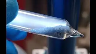 The mysterious glow of Cesium chloride under irradiation in vacuum.