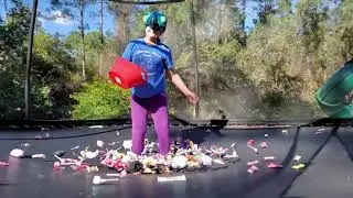 Halloween jumping on the trampoline to catch candy blindfolded