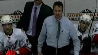 Raw Video: Hockey Coach Breaks Stick in Outburst