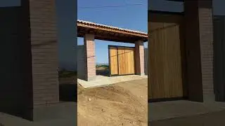 Port&atilde;o de ch&aacute;cara,automatizado feito com ferro e madeira
