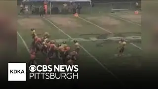 Youth football game fight caught on video